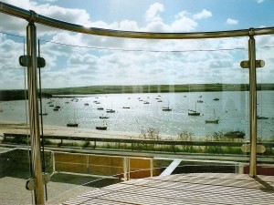 Stainless-Steel-and-Curved-Glass-Balcony-1 